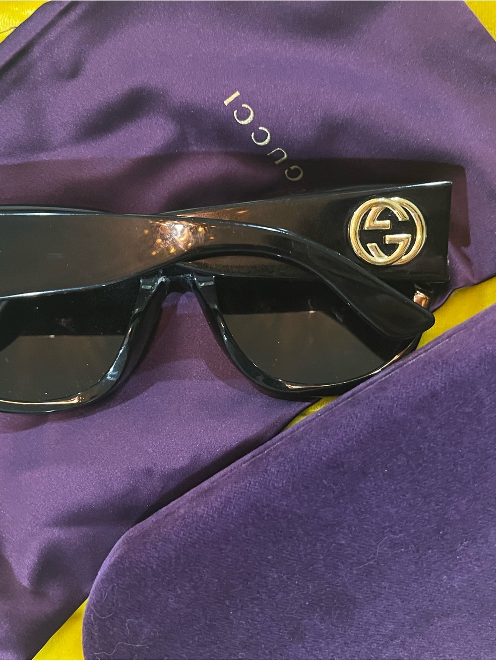 Gucci Black Shield Sunglasses with Gold Logo Accent